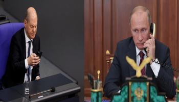 أولاف شولتز وفلاديمير بوتين