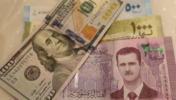 الليرة السورية والدولار - أرشيفية 