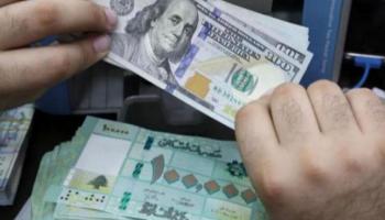 100 ألف ليرة لبنانية ودولار أمريكي 