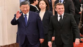 جانب من لقاء ماكرون وشي