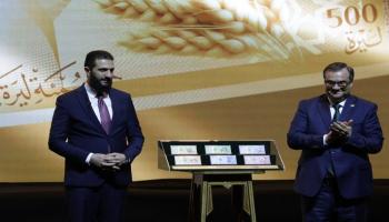 الرئيس السوري يطلق الليرة الجديدة - أ ف ب