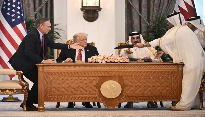 جانب من توقيع الاتفاقيات - أ ف ب