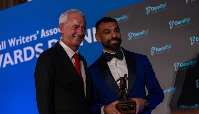 محمد صلاح وإيان راش
