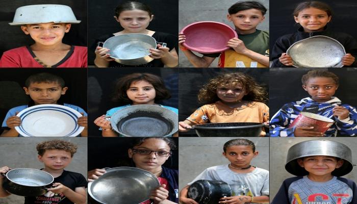 أطفال فلسطينيون يقفون مع أوانيهم أثناء انتظارهم في نقطة توزيع وجبات بغزة
