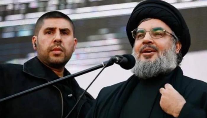 حسن نصر الله ومرافقه