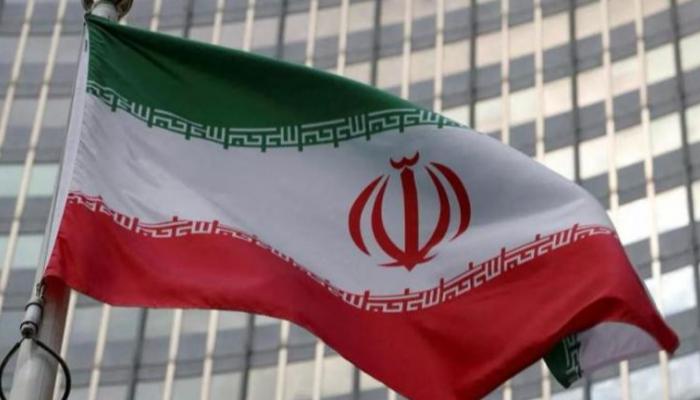 علم إيران أمام مقر الوكالة الدولية للطاقة الذرية في فيينا