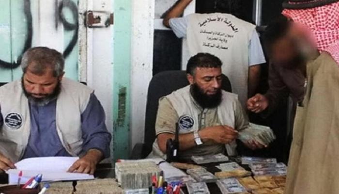 عناصر في تنظيم داعش تجمع أموالا- أرشيفية