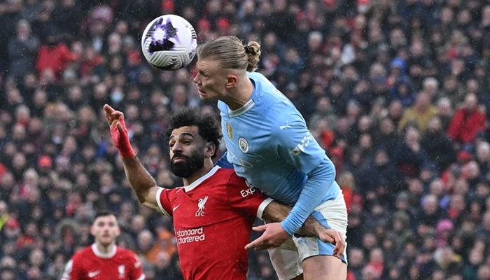 محمد صلاح وإيرلينغ هالاند