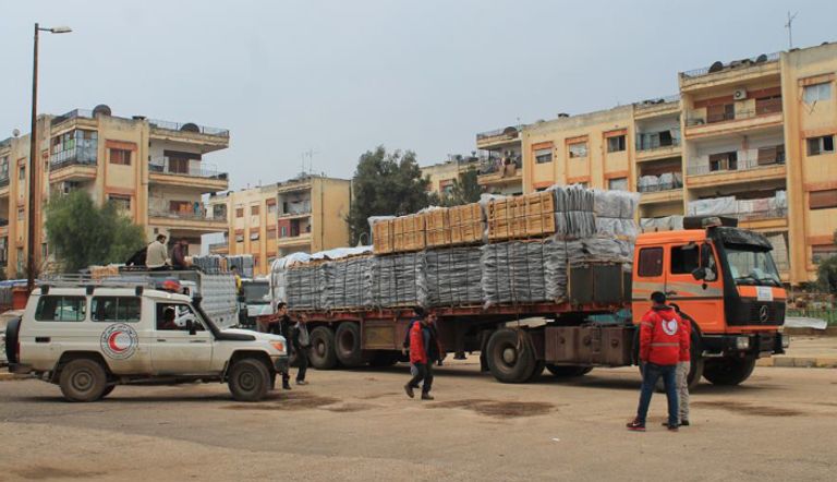 دخول قافلة مساعدات إلى حى الوعر المحاصر- ارشيفية
