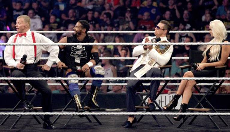 نزال بين إيه جيه ستايلز وكارل أندرسون وبين إنزو أموري وكولين كاسادي