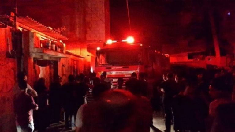 جانب من عملية انقاذ أطفال عائلة الهندي