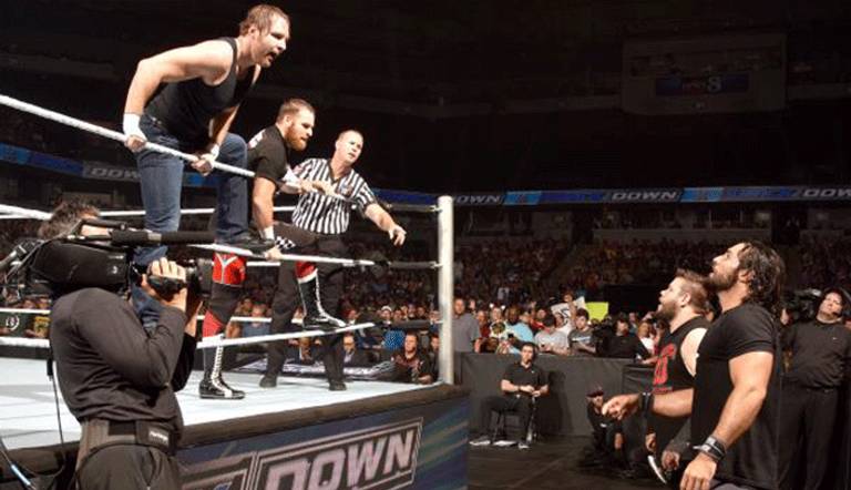 نزال بين إيه جيه ستايلز وكارل أندرسون وبين إنزو أموري وكولين كاسادي