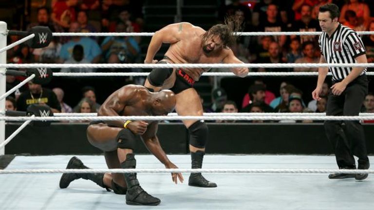 نزال جون سينا وإيه جيه ستايلز