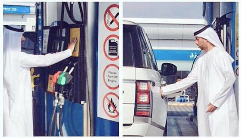 وزير الطاقة الإمارتي أثناء تعبئته لوقود سيارته بنفسه