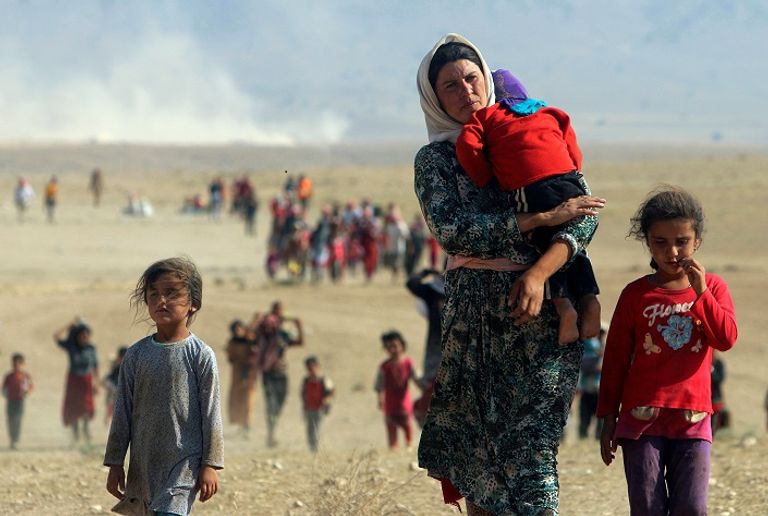 صورة أرشيفية لنازحين من اليزيديين في العراق (رويترز)