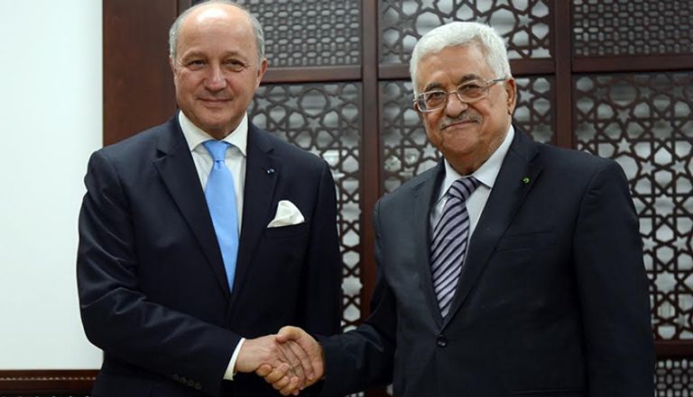 الرئيس الفلسطيني مع وزير الخارجية الفرنسي