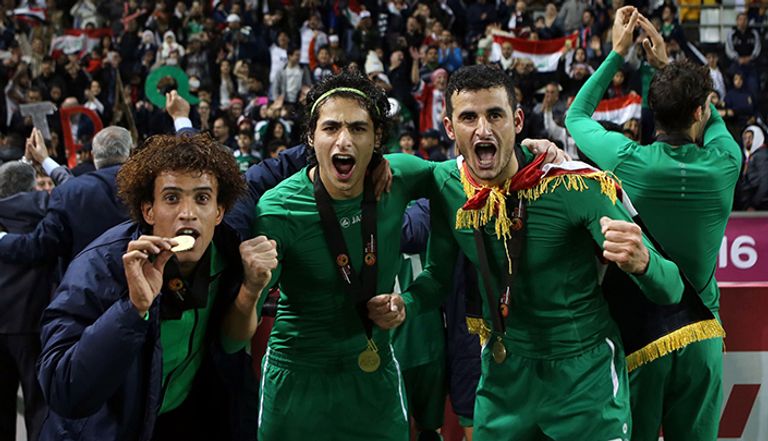 لاعبو العراق يحتفلون بالتأهل للأولمبياد