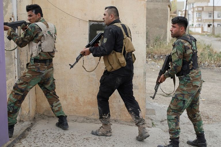  صورة أرشيفية لمقاتلين أكراد (رويترز)