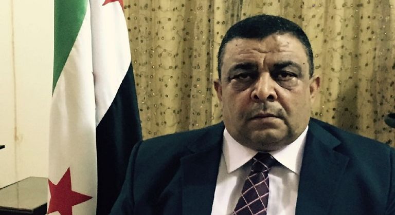 رجل سوري عقب قصف منزله فى حلب 