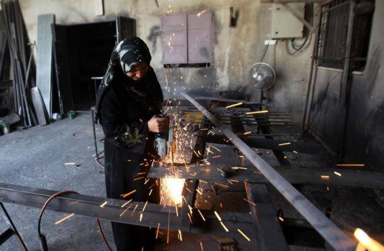 رنيم الصفدي إمرأة تتسلح بعزيمة الرجال