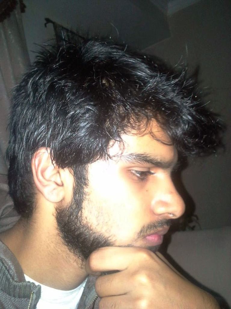 والدا محمد حمزة خان أثناء توجههما لإحدى محاكماته في شيكاجو (أرشيفية)