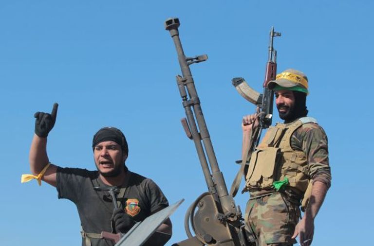 فتاة فارة من أحياء الموصل