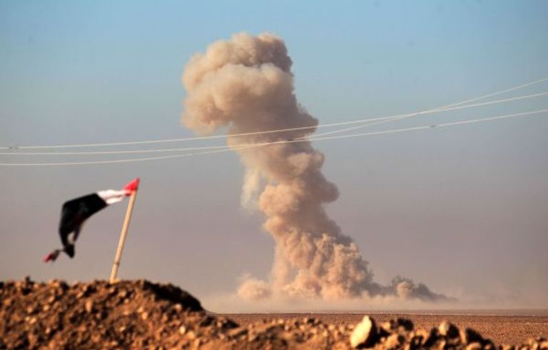 فتاة فارة من أحياء الموصل