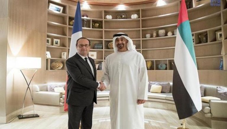 الشيخ محمد بن زايد يستقبل الرئيس الفرنسي