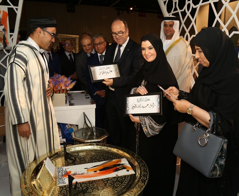 القبيسي وبنشماس في خلال افتتاح الفعالية