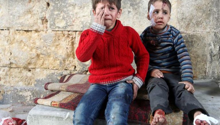 طفلان من حلب (رويترز)