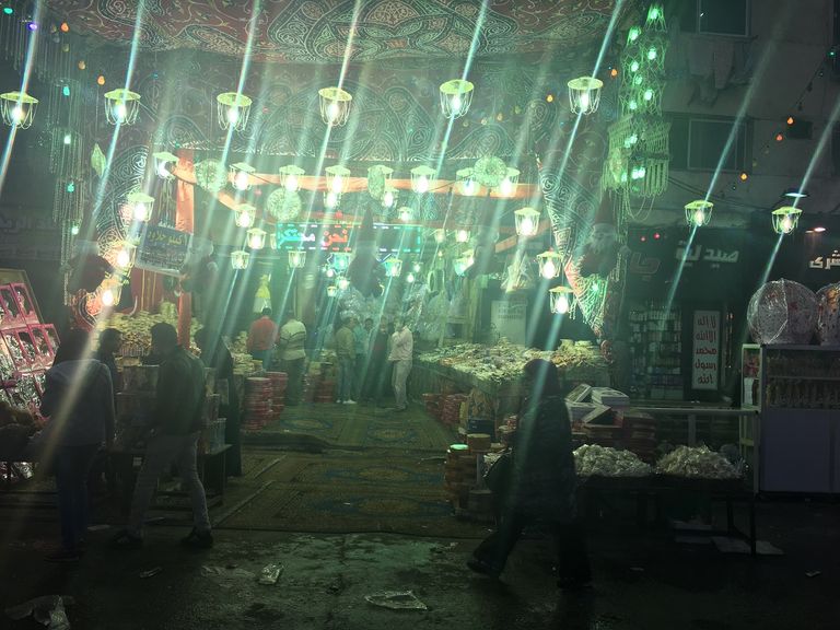 بابا نويل بجوار حلوى المولد