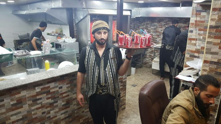 السوري قاطرجي داخل مطعمه في غزة