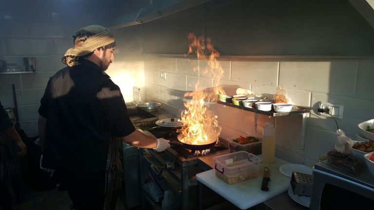 السوري قاطرجي داخل مطعمه في غزة