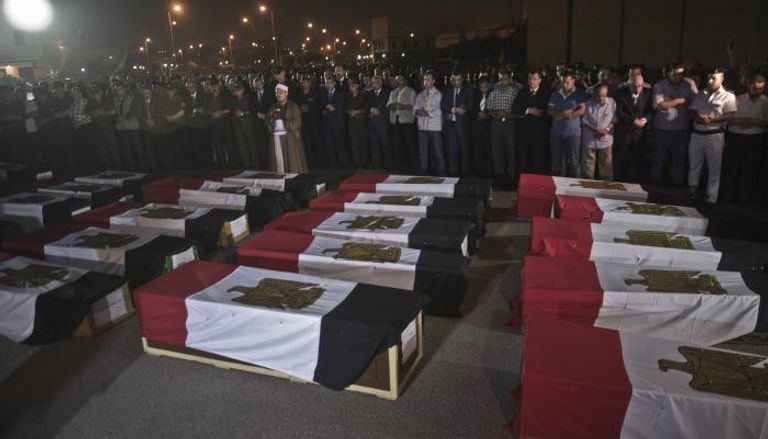 صورة أرشيفية لجنازة شهداء مذبحة رفح 