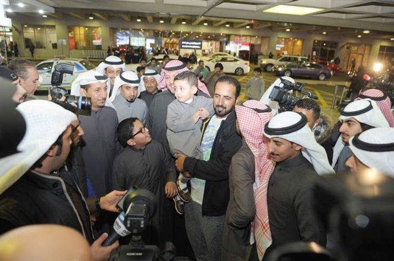 الكويتيون الأربعة بعد عودتهم