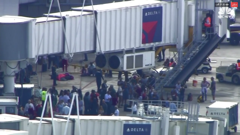 جانب من موقع إطلاق النار بالمطار