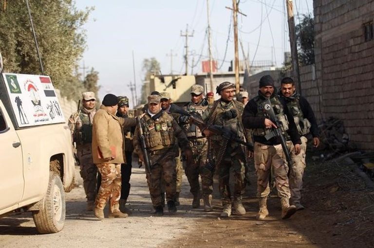 جندي عراقي خلال اشتباكات مع متشددي داعش