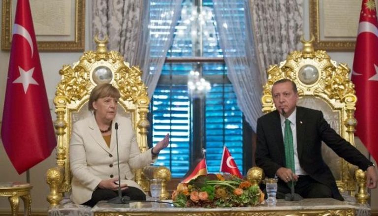ميركل وأردوغان في لقاء سابق