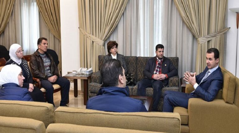 الأسد خلال استقبال رجال الصناعة فى دمشق
