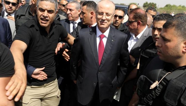 رامي الحمد الله لدى وصوله إلى قطاع غزة - رويترز