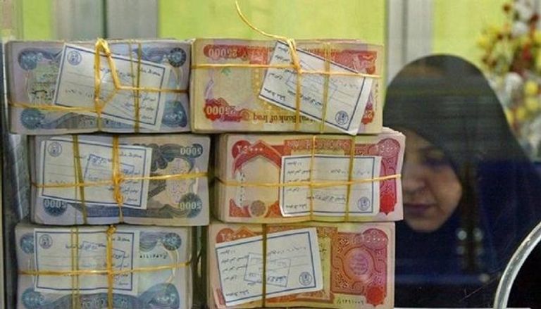 فئات مختلفة  من العملة العراقية- أرشيف