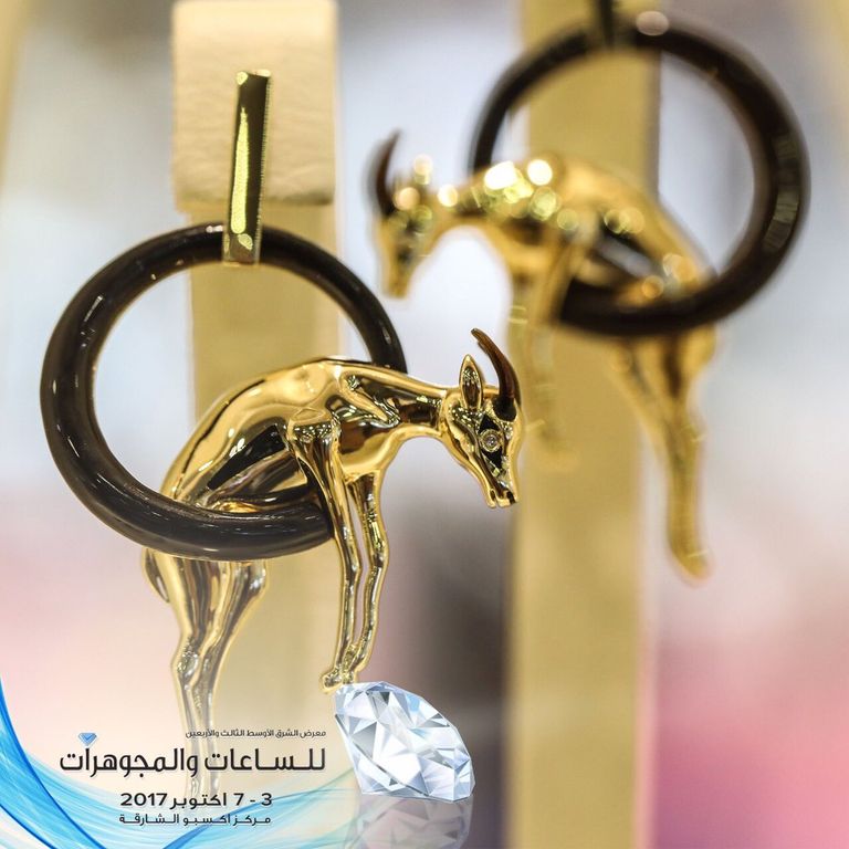 شعار معرض الشرق الأوسط للساعات والمجوهرات بالشارقة