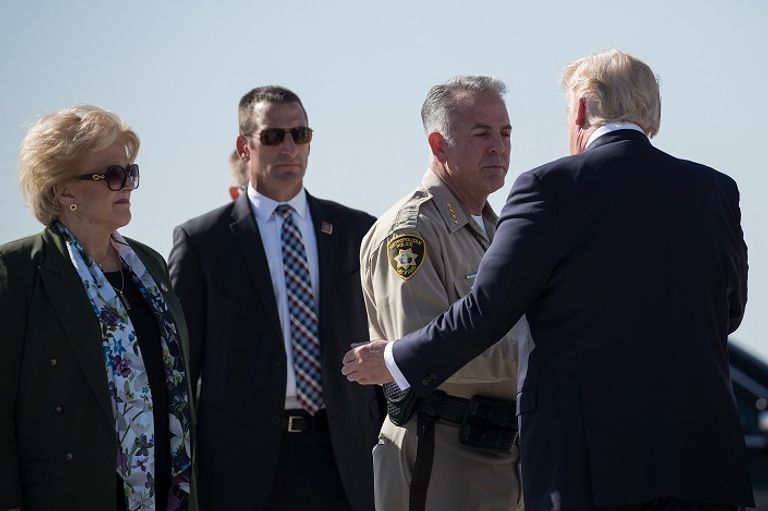 الرئيس ترامب وزوجته خلال وصولهما لاس فيجاس - أ. ف. ب