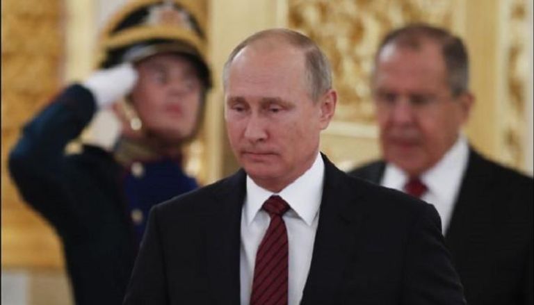 الرئيس الروسي فلادميير بوتين ووزير خارجيته