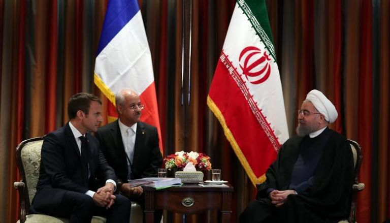 الرئيسان الفرنسي والإيراني
