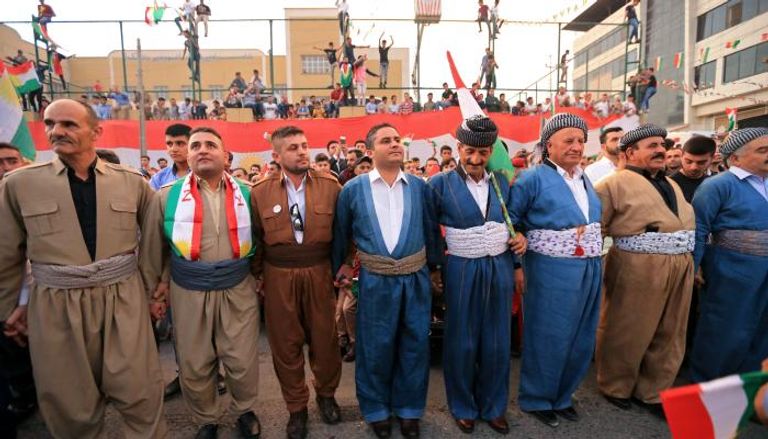 أكراد يحتفلون بنتائج الاستفتاء (رويترز)