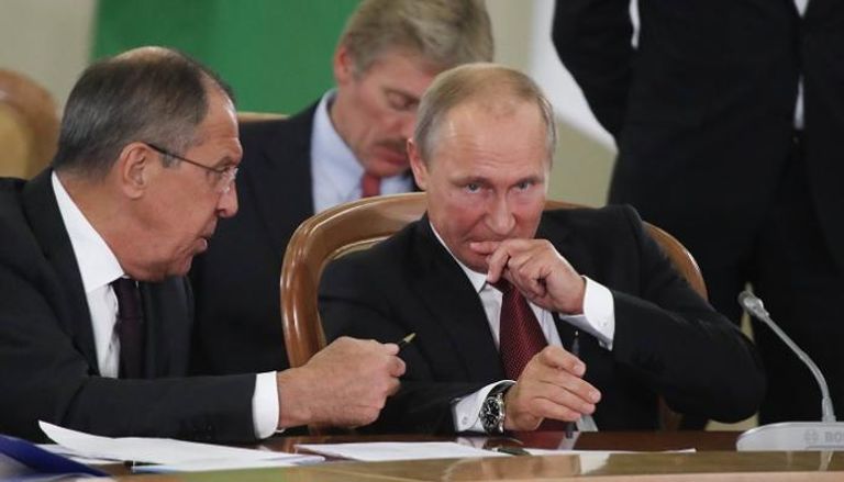الرئيس الروسي بوتين ووزير الخارجية لافروف - رويترز