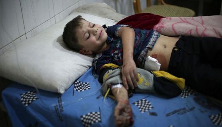 أحد أطفال الغوطة من مصابي القذيفة