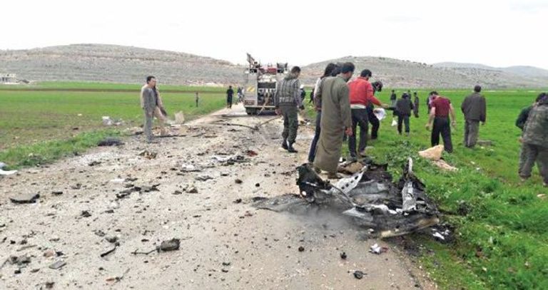 الرئيس التركي خلال زيارته الأطفال الثلاثة عند ولادتهم بمخيم للاجئين