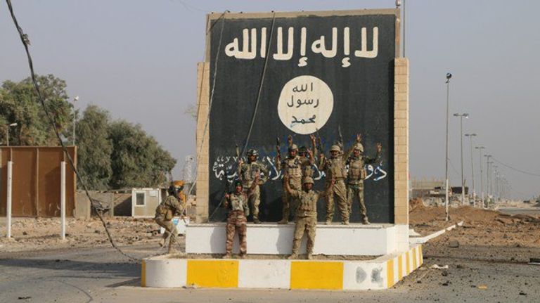 القوات العراقية ومليشيا الحشد الشعبي في المدينة